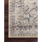 Featuring soft motifs in a carefully curated color palate of ivory, blue, green, and hints of purple, the Hathaway Multi / Ivory area rug captures the essence of one-of-a-kind vintage or antique area rug. This rug is ideal for high traffic areas such as living rooms, dining rooms, kitchens, hallways, and entryways.