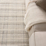 Handwoven in India, the Park City Promontory by Barclay Butera evokes a masculine modernity through neutral-toned grids. The modern Promontory rug showcases a grid in on-trend hues of cream and gray. The cut and looped pile adds texture while maintaining a soft hand. Amethyst Home provides interior design, new home construction design consulting, vintage area rugs, and lighting in the Scottsdale metro area.