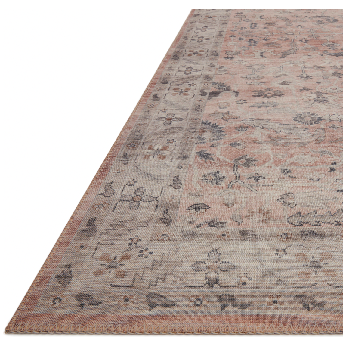 Featuring soft motifs in a carefully curated color palate of blush, pink, ivory, and hints of grey, the Hathaway Blush / Multi area rug captures the essence of one-of-a-kind vintage or antique area rug at an attractive price.