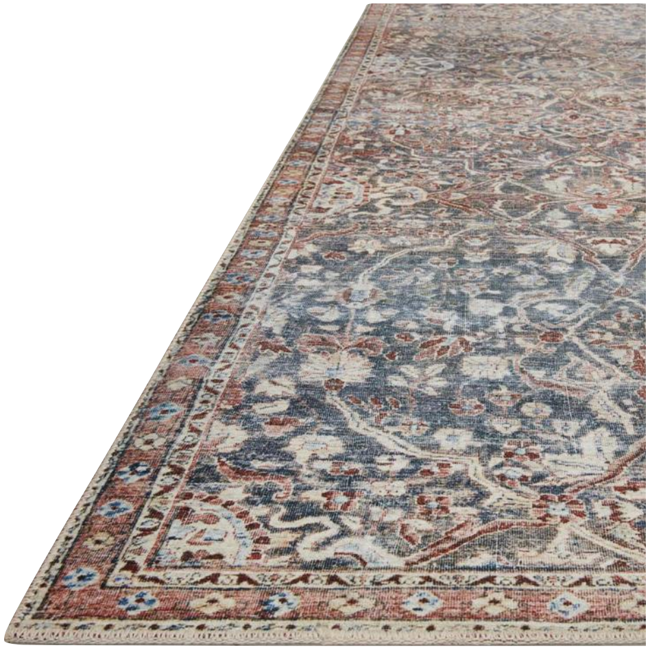 Durable, low pile, and soft underfoot, this rug is inspired by classic vintage and antique rugs. The Jules Chris Loves Julia Denim / Spice rug from Loloi features a beautiful vintage pattern and patina. The rug is easy to clean and maintain and perfect for living rooms, dining rooms, hallways, and kitchens!