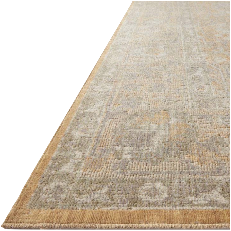 Durable, low pile, and soft underfoot, this rug is inspired by classic vintage and antique rugs. The Rosemarie Chris Loves Julia Gold / Sand ROE-01 rug from Loloi features a beautiful vintage pattern and patina. The rug is easy to clean, never sheds, and perfect for living rooms, dining rooms, hallways, and kitchens!