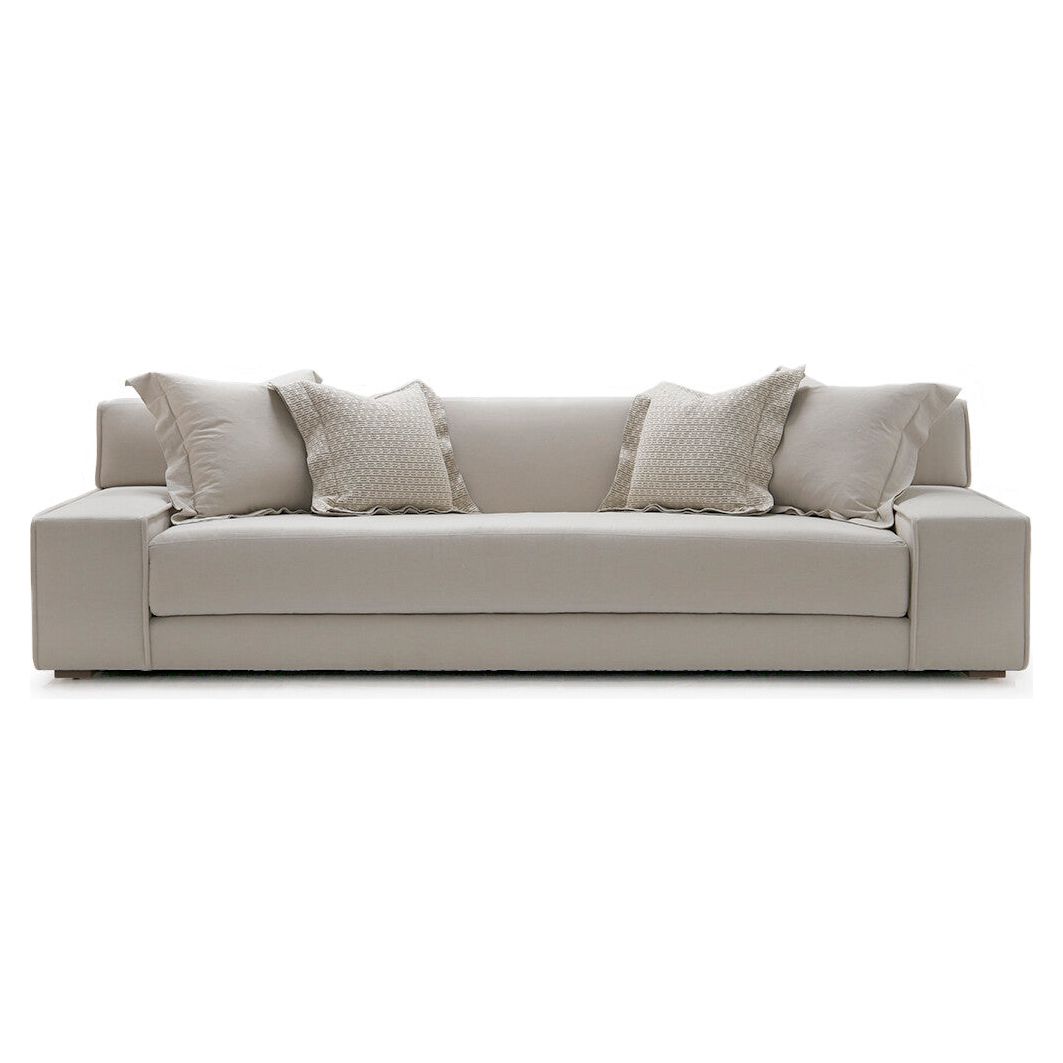 The ultimate low, cozy sofa. We would put this Esme sofa from Verellen in the family room, living room, or movie theater. The juxtaposition of a juicy, miniature-spring filled down-wrapped cushion and firm back is ultra comfortable. We love the thick, firm arms for resting cell phones & snacks. Enjoy this sofa upholstered or slipcovered.