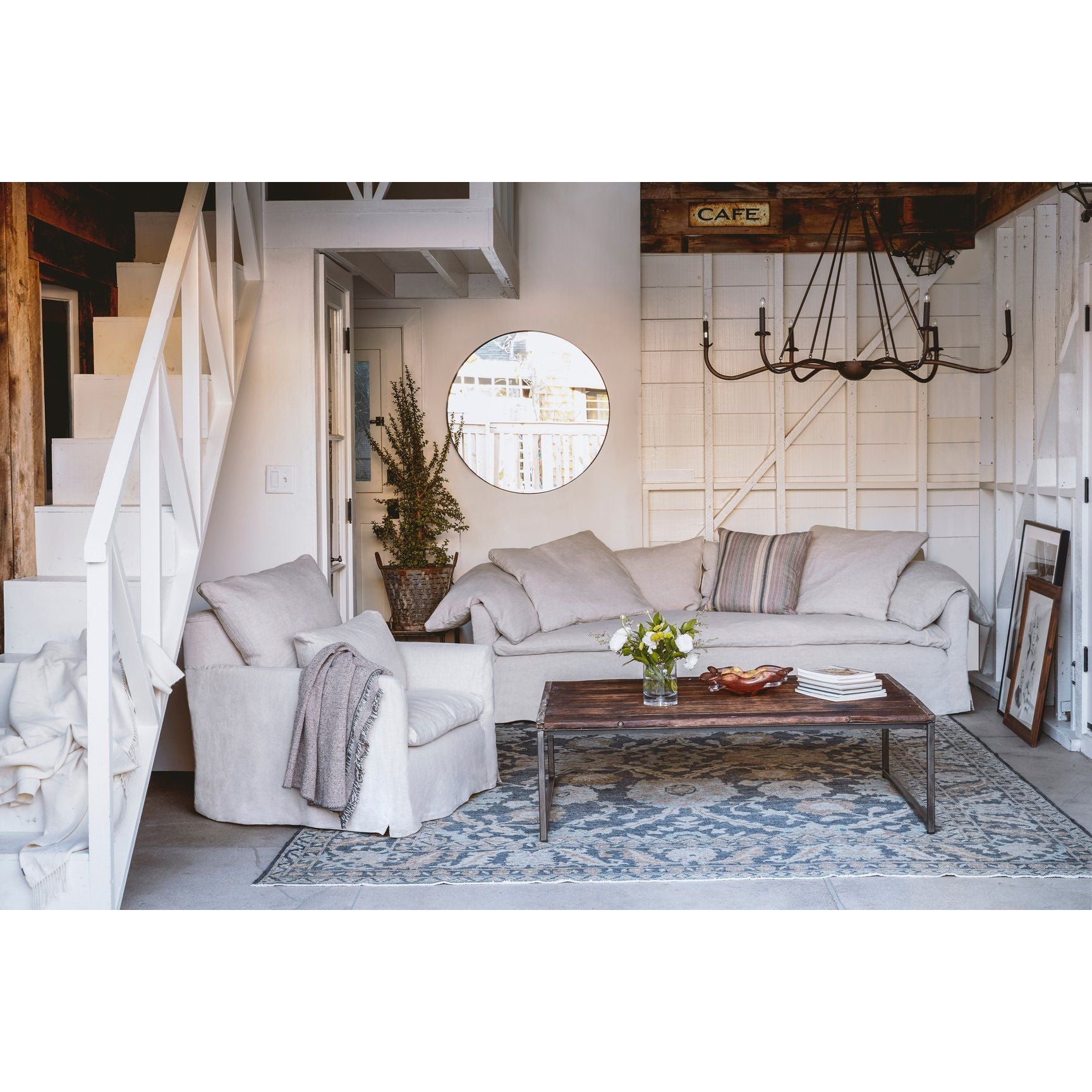 Our slipcovered Donato Chair from Cisco Brothers is one of our dreamiest seats! This photographed version of the chair was made in a beautifully made white denim of 100% cotton. This chair is equal parts casual and chic. A triple washed down feather cushion feels like a cloud with upholstered support beneath!  Overall Size: 36"w x 37"d x 31"h Seat Space: 25"w x 18"d x 16"h Arm Height: 24"h