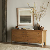 Rounded, chunky dowel legs in an amber oak finish support the overhang top of of this dresser. Six drawers provide ample storage, finished with simple gunmetal hardware Amethyst Home provides interior design, new home construction design consulting, vintage area rugs, and lighting in the Salt Lake City metro area.