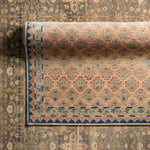 The handknotted Mihret collection gathers inspiration from traditional patterns that offer elegance and a refined, modern colorway. Expertly handcrafted in India with 64 knots per square inch for unparalleled quality, the Arpina design features traditional floral and scrolling details and a thick border. Amethyst Home provides interior design, new home construction design consulting, vintage area rugs, and lighting in the Calabasas metro area.