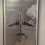 This Shimmering Airplane has us craving for travel. Hang in your office, bedroom, or area to elevate the space.   Size: 44" x 72" Medium: Silver Leafed Paper Specialty: Giclee on Hand Applied Silver Leaf  Each piece is made just for you! Please allow 6-8 weeks for production and delivery.