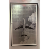 This Shimmering Airplane has us craving for travel. Hang in your office, bedroom, or area to elevate the space.   Size: 44" x 72" Medium: Silver Leafed Paper Specialty: Giclee on Hand Applied Silver Leaf  Each piece is made just for you! Please allow 6-8 weeks for production and delivery.